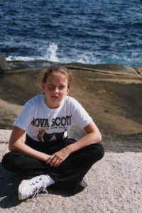 Peggy's cove Brit sitting on rock.jpg (70331 bytes)