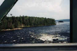 rapids sans raft from bridge.jpg (65407 bytes)